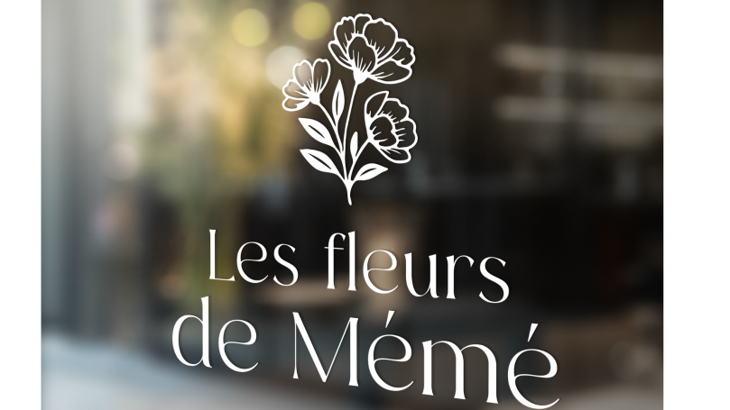 Logo de "Les fleurs de Mémé" avec un motif floral délicat.